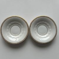 Coppia di piattini Finzi in oro zecchino
