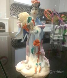 Statuina giapponese in ceramica