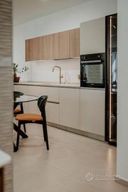 Cucina moderna modello Skin con sistema Easy Table
