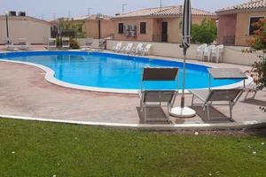 Villetta con giardino e piscina/tennis cond