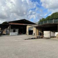 Immobile industriale e terreni edificabili a Latin