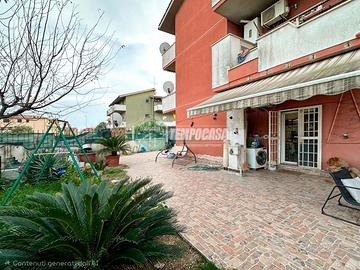 Appartamento con ampio giardino e cantina