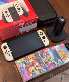 Nintendo Switch OLED + 4 Giochi + Custodia + Base