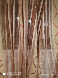 Tenda in raso toni bruciato e giallo arancio