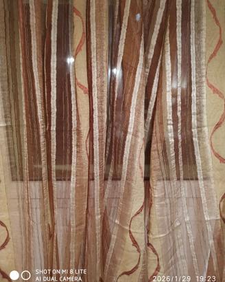 Tenda in raso toni bruciato e giallo arancio