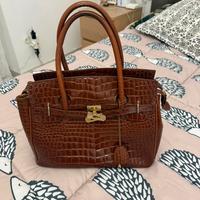 Borsa ghibli un pitone marrone