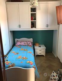 letto singolo completo ,comodino e rete