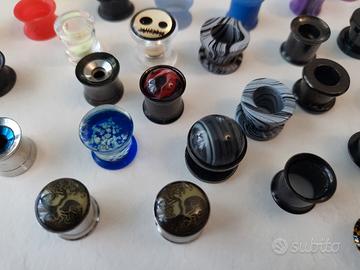 piercing orecchini tunnel plug