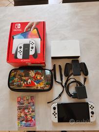 Nintendo Switch OLED+Mario Kart 8 Deluxe+custodia 