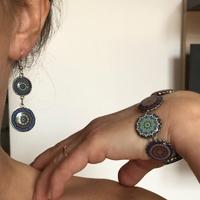 Bracciale e orecchini con motivo mandala