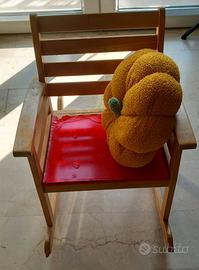 Seggioline dondolo per bambini.