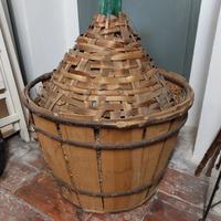 vecchia damigiana   rivestita in legno/canniccio