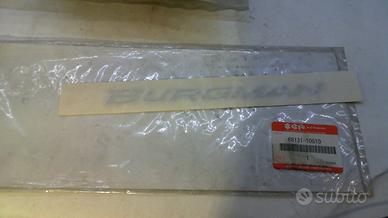 EMBLEMA BURGMAN SUZUKI 68131-10G10-000