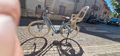 Bicicletta da donna con sediolino