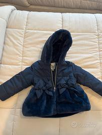 Giubbotto blu con cappuccio e pellicciotto
