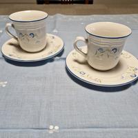 Coppia di tazze con piattino 