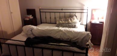 Letto ferro battuto.