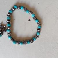 Bracciale con perline e ciondolo a tartaruga 