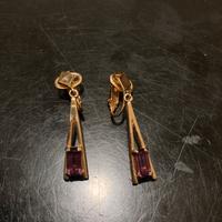 Orecchini pendenti oro con pietre viola