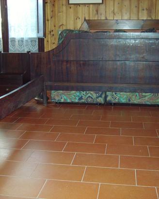 Letto in legno Palissandro con comodini integrati