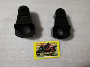 Semimanubri rialzati regolabili orientabili