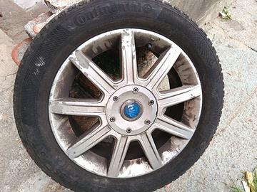 4 cerchi in lega + copertoni