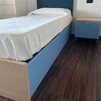 Letto singolo e comodino