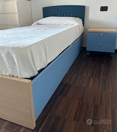 Letto singolo e comodino