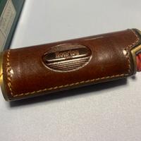 Roaring porta acc. Mx in cuoio anni 80