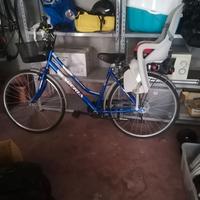 Bicicletta da donna con seggiolino