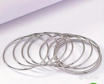 8 bracciali rigidi da donna placcati k