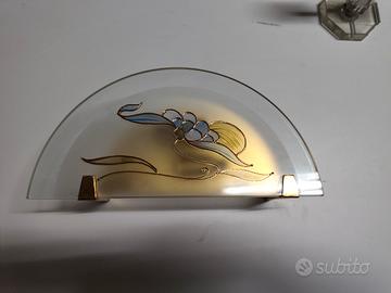 applique in metallo dorato 