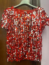 Blusa rossa scintillante