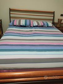 letto matrimoniale in ciliegio e ferro