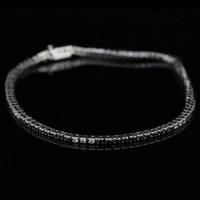 TENNIS BRACCIALE ORO 18KT BRILLANTI NERI E BIANCHI