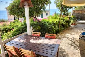 Elegante Casa Vista Mare con giardino a Pomonte