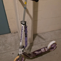 monopattino con cavalletto e bretella