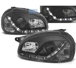 FARI OPEL CORSA B 93-00 LUCE DIURNA A LED FONDO NE