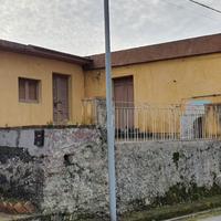 Casa e terreno edifiabile