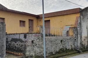 Casa e terreno edifiabile