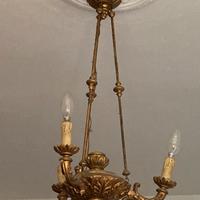 Lampadario in legno intagliato