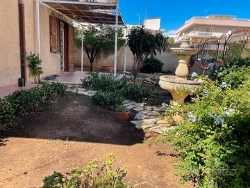 Bilocale con giardino privato