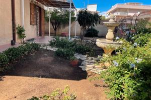 Bilocale con giardino privato