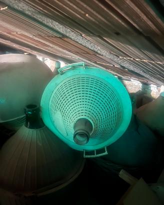 Damigiane in vetro con cestello in plastica