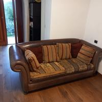 Divano letto in pelle e tessuto