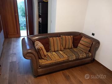 Divano letto in pelle e tessuto