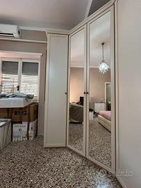 Armadio angolare 7 ante con cabina armadio