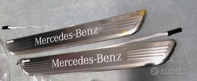 Battitacchi illuminati originali per Mercedes CLS