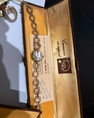 Orologi e medaglir in argento