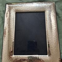 Cornice in argento